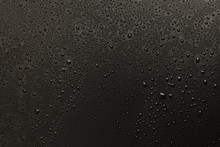Water Drops On Black Background. Macro.