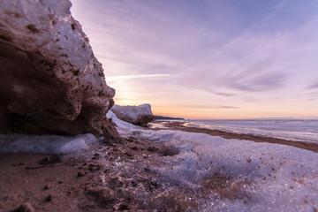 Wall Mural -  Winter landscape. Coast line. Sea covered blocks of ice.