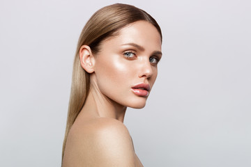 beauty portrait of model with natural make-up. fashion shiny highlighter on skin, sexy gloss lips ma