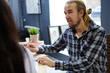 © pressmaster - Adolescent man listening to opinion of his co-worker