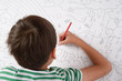 © wckiw - Little boy draw and painting pencil color on the paper home activities