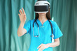 A doctor in a virtual reality helmet conducts a remote operation or is trained, photo with depth of field