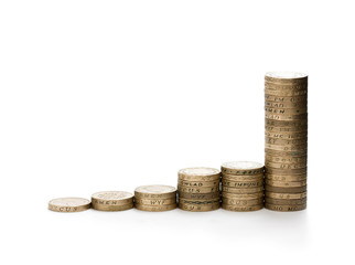 Wall Mural - Financial  growth concept of 1 pound stacked coins isolated on white