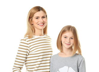 happy mother and daughter on white background