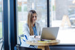 © LStockStudio - Beautiful Young Woman Working on Laptop