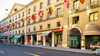 Wall Mural - Rue Corraterie Street with Swiss flags of Geneva