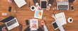 © Prostock-studio - Group of busy business people meeting in office, top view