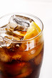 © virtustudio - Soda drink close-up. Top view of cola with ice and lemon.