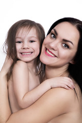 portrait of happy young mother with her daughter isolated on white bac