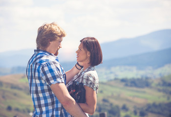 Happy beautiful couple of travelers in love