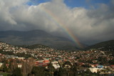 Fototapeta Tęcza - Rainbow over Mount Wellington into Hobart, Australia