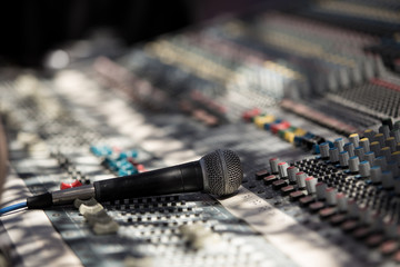 Microphone closeup on sound mixer at concert