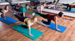 © JackF - People relaxing and enjoying yoga