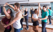 © JackF - Adults dancing bachata together in dance studio