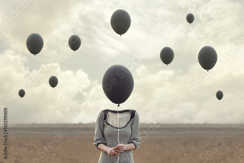 Fotografía surreal image of woman and blacks balloons flying