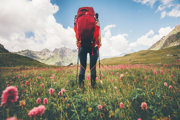 traveler woman hiking in mountains travel lifestyle concept adventure summer vacations outdoor mount