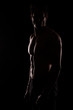 © Milkica - handsome muscular young bodybuilder showing his muscles and abs while posing shirtless