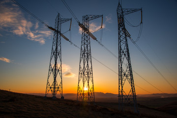 eletric pylons at sunset