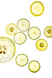 © Myriam Ramel - Yellow and green lemons, grapefruit, kiwi and pomelo in transparency