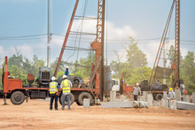Two Engineer Inspec Construction Site Pile Driving