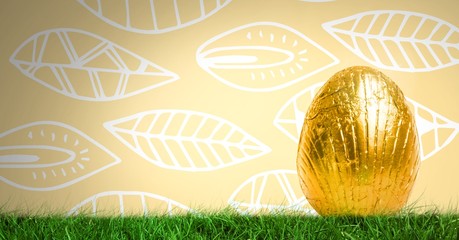 Wall Mural - Easter Egg in front of leaf pattern