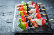 © shaiith - Closeup of tasty finger food with vegetables and herbs