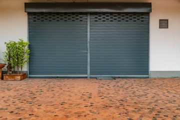 Old gray roller shutter gate