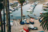 Fototapeta Mapy - The boat dock near the old city of Dubrovnik, Croatia. The harbor, a marina, near the ancient city.