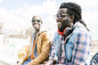 © santypan - Two black race friends having fun.