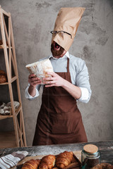 Sticker - Screaming man baker standing with paper bag on head