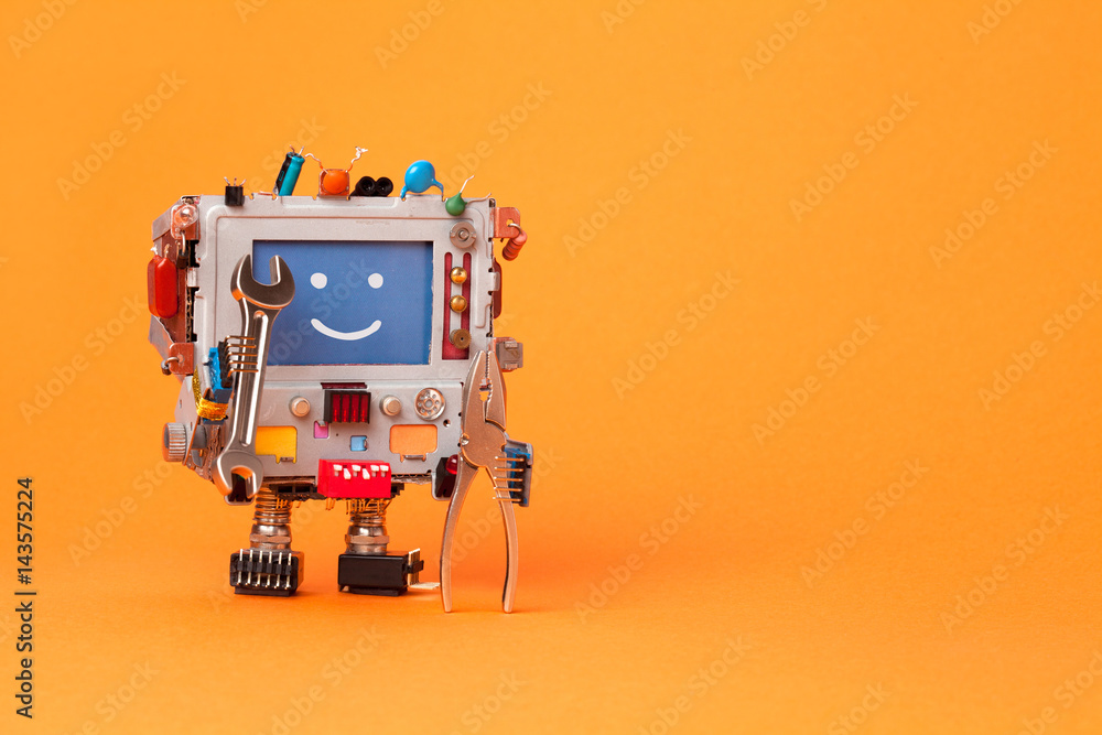 Robot Fixing Computer Fixing computer concept. Robotic electrician with hand wrenches for ...