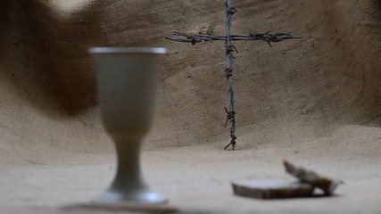 Canvas Print - Chalice Of Wine With Bread And Crucifix  On The Burlap.. Rack Focus.