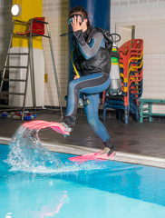 Wall Mural - scuba diving course pool teenager girl with instructor  

