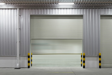 Wall Mural - Roller door or roller shutter. Also called security door or security shutter with automatic system. For protection industrial building i.e. factory, warehouse, hangar, workshop, store, hall or garage.