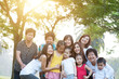 © WONG SZE FEI - Large group of Asian multi generations family outdoors fun