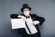 © Nomad_Soul - Male mime actor with empty paper sheet