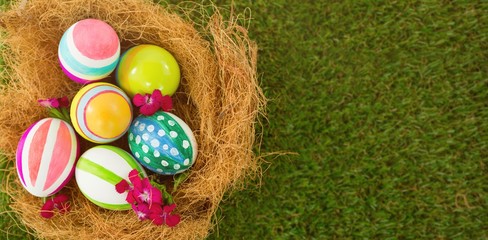 Wall Mural - Painted Easter eggs in nest