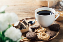 Black Coffee In White Cup With Cookie And Dessert