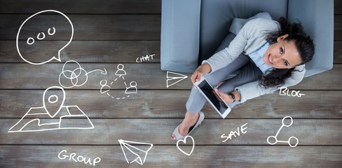 Wall Mural - composite image of woman on her tablet looking up