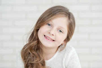 close up of little girl smiling