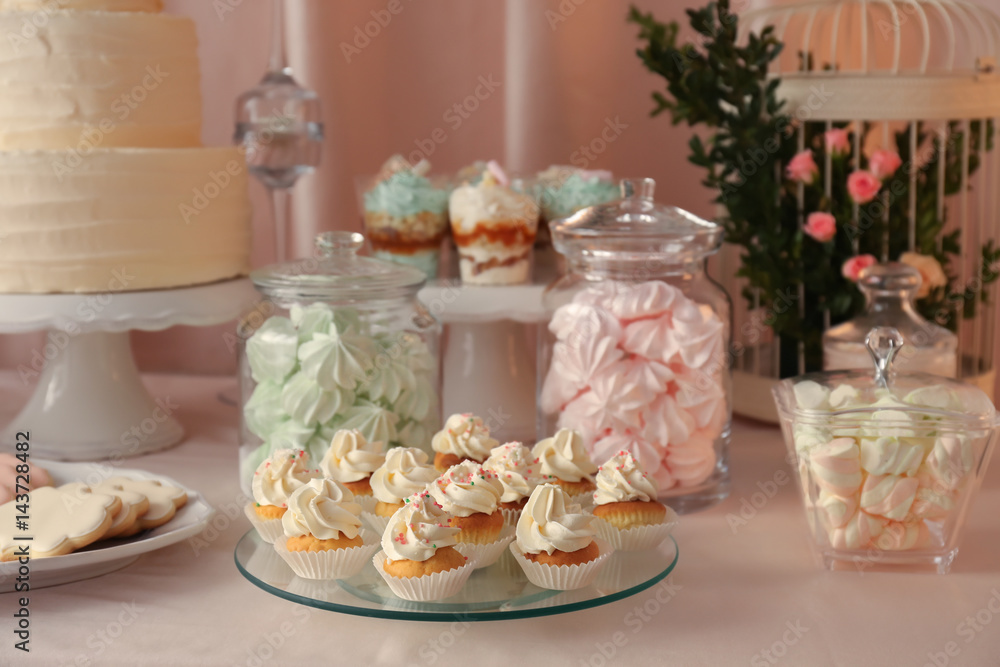 Candy bar. Table with different sweets for party
