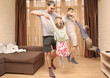 © Africa Studio - Male gay couple with children having fun at home