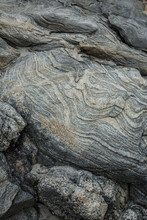 Swirling Layers In Gneiss Bedrock Of Harkness Park, Waterford, Connecticut.
