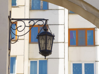 Street lamp on the wall.