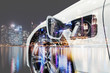 © zapp2photo - Electric vehicle , Smart car , Air pollution and reduce greenhouse gas emissions concept. Double exposure of charging Electric car with power cable supply plugged in and city night light view.