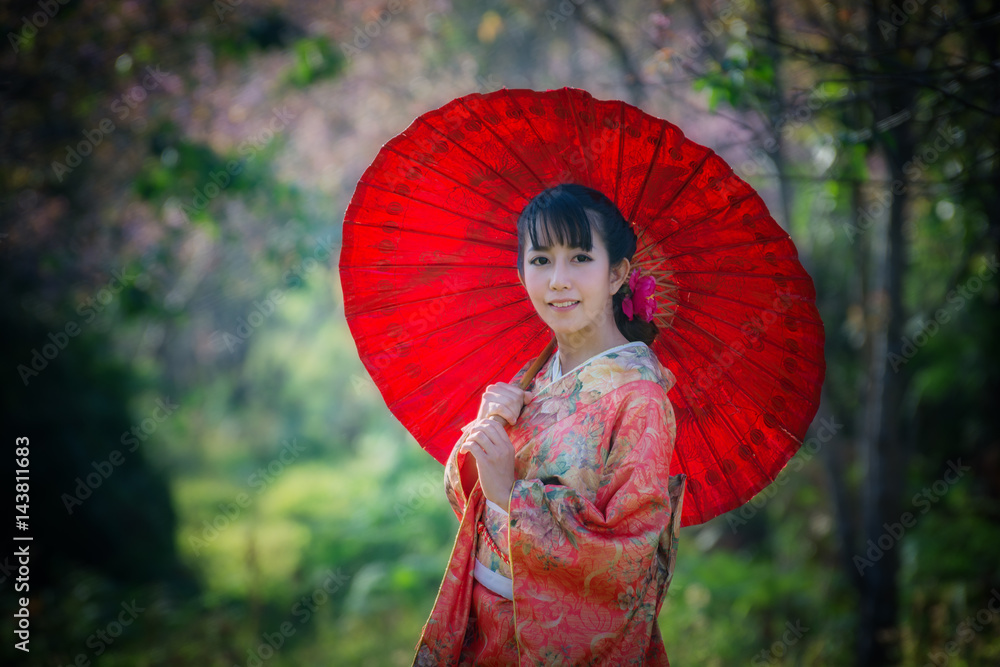 Asian Women in kimono traditional dress holding red umbrella of a Japanese  is a very beautiful Stock Photo | Adobe Stock