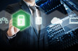 © canjoena - Double exposure of IT Manager touch security on digital screen to prevent system and devices from virus attack with server network storage background in security technology concept