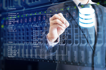 Double exposure of professional businessman system analysis design and drawing database table with server storage technology background