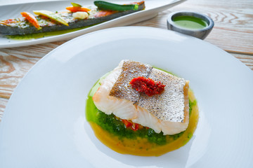 Wall Mural - Atlantic hake over dried tomato ratatouille