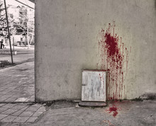 Splattered Blood Stain On White Background. Halloween Background. Blood On Wall And Ground.